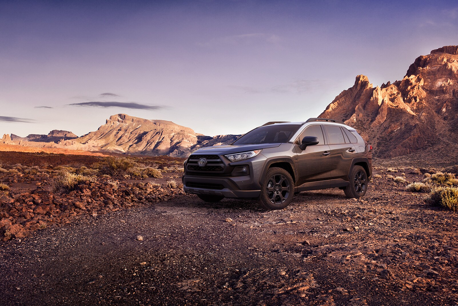 Performance features of the 2020 Toyota RAV4 and RAV4 Hybrid at Bobby Rahal Toyota | Grey 2020 Toyota RAV4 parked on rocky road Performance features of the 2020 Toyota RAV4 and RAV4 Hybrid at Bobby Rahal Toyota | Grey 2020 Toyota RAV4 parked on rocky road
