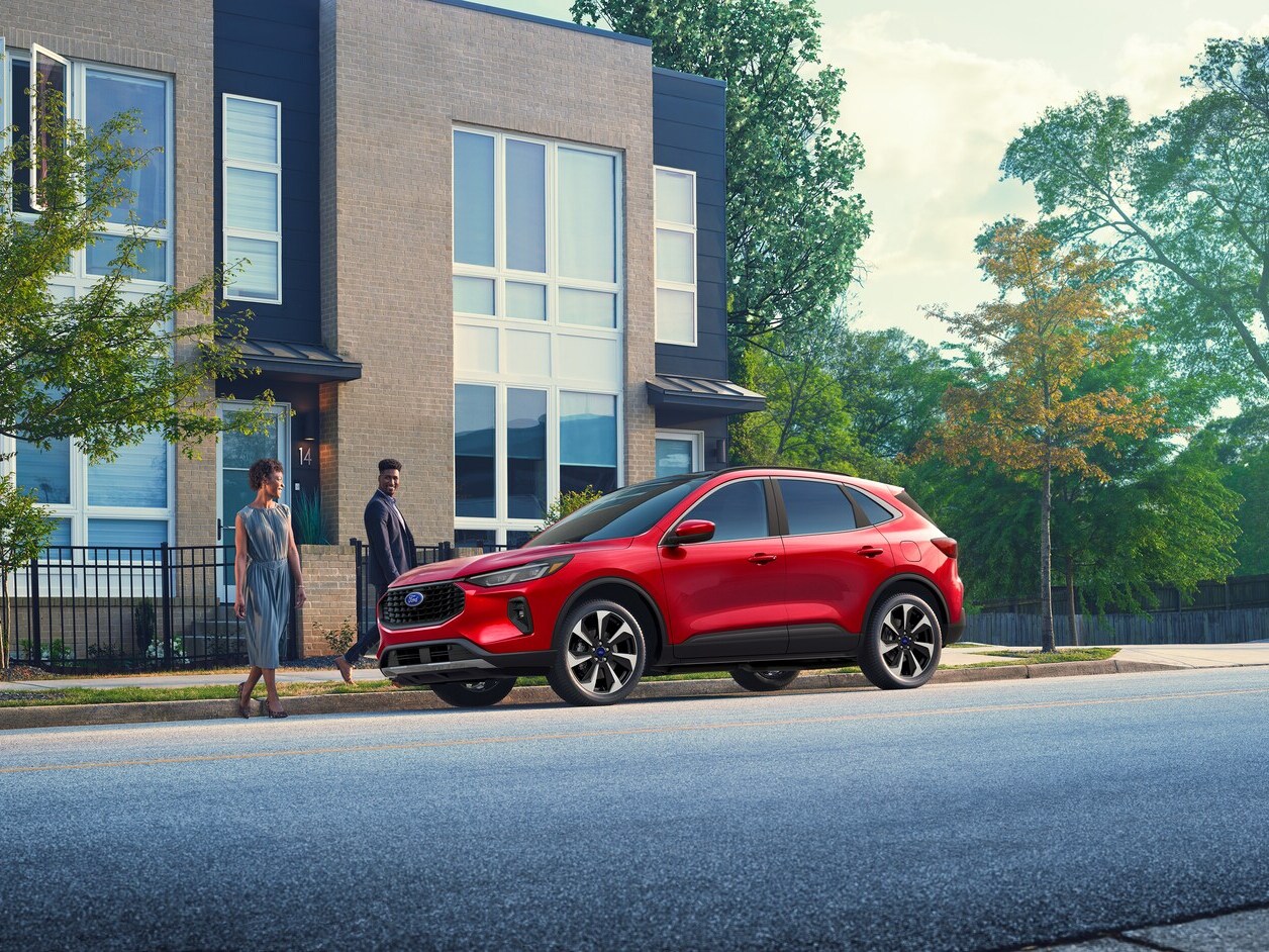 Red Ford Escape Plug-in Hybrid Red Ford Escape Plug-in Hybrid parked outdoors