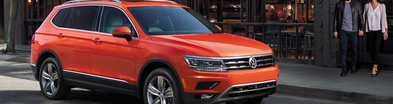 2019 VW Tiguan exterior in Colorado Springs Bob Penkhus Volkswagen.png Front passenger side exterior view of an orange 2019 Volkswagen Tiguan