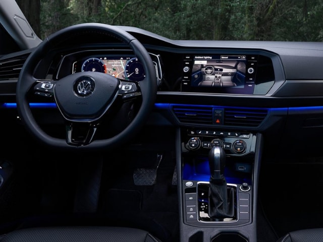 new 2019 VW Jetta interior in Colorado Springs Bob Penkhus VW.png front interior cabin 2019 vw jetta blue light accent