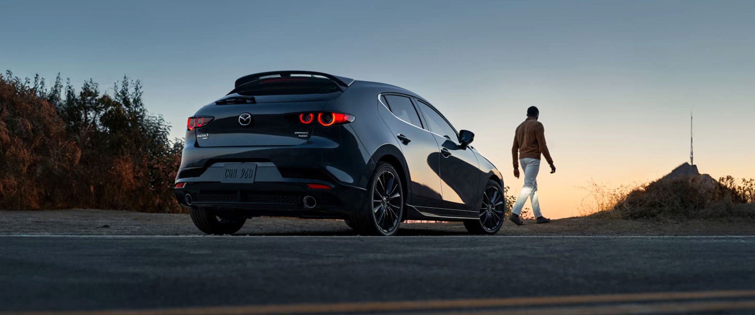 2024-mazda-3-vs-civic-hatchback.jpg