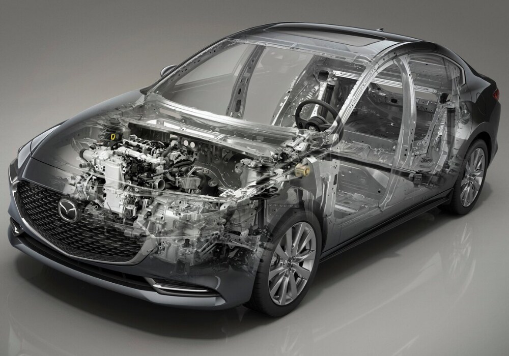 2020 Mazda3 2.5L SKYACTIV-G Engine.png 2020 Mazda3 sedan with transparent exterior giving you a peek at the engine and frame