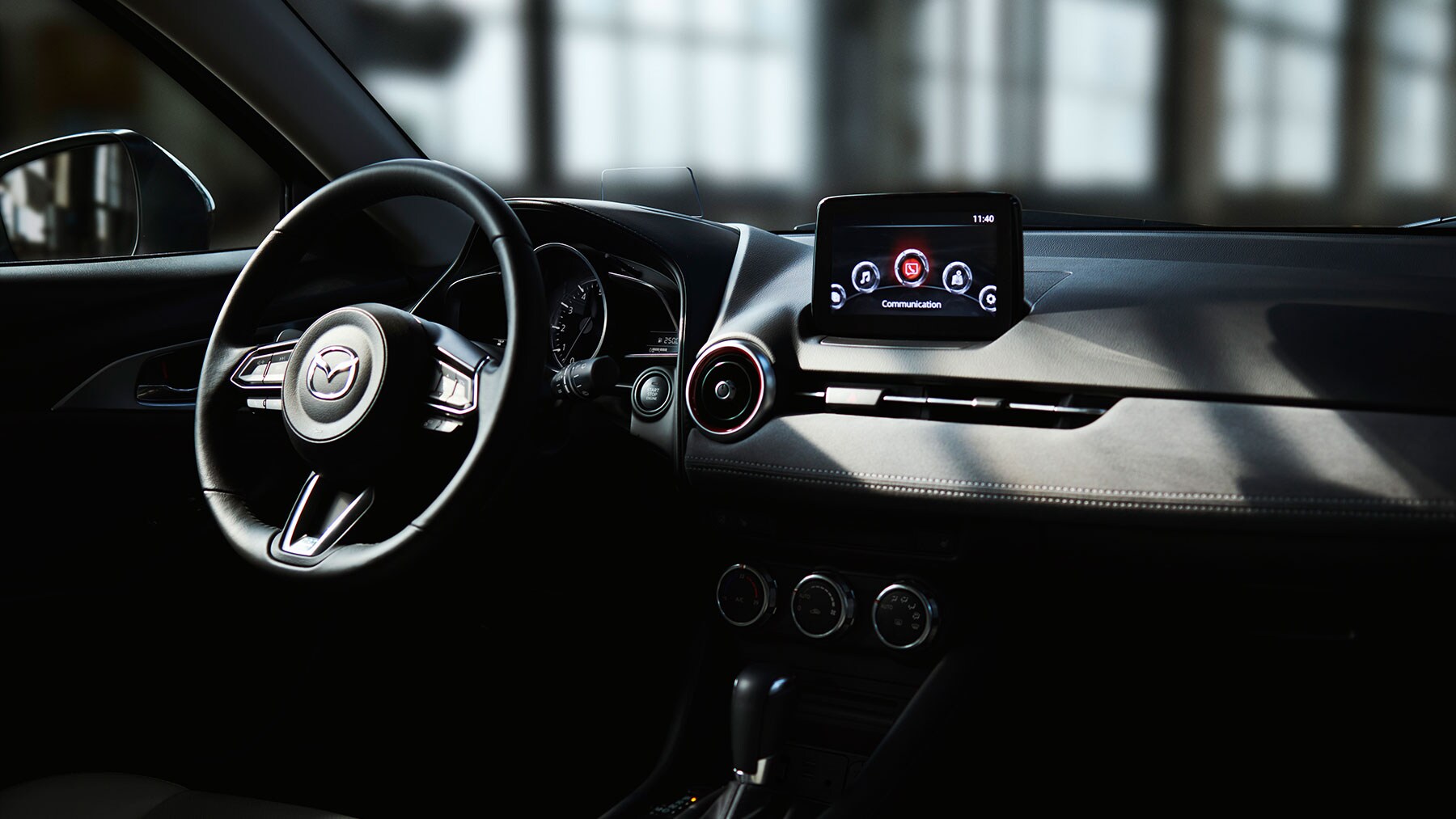2019-mazda-cx-3-dashboard-bob-penkhus-mazda-dealership-powers-colorado-springs.jpg the dark interior dashboard of a 2020 Mazda CX-3