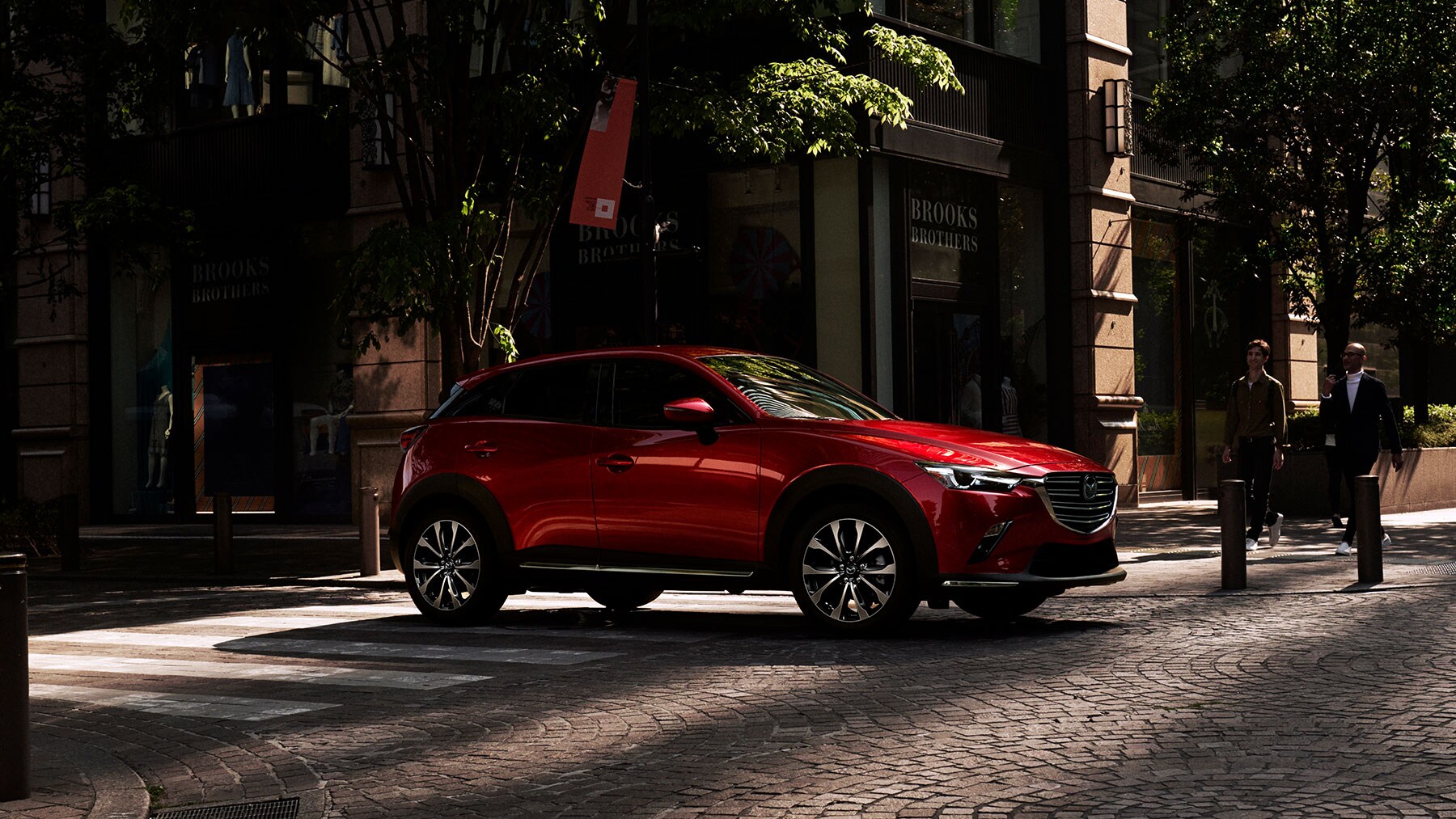2019-mazda-cx-3-compact-car-bob-penkhus-mazda-dealership-powers-colorado-springs.jpg a red 2020 Mazda CX-3 parked in the city