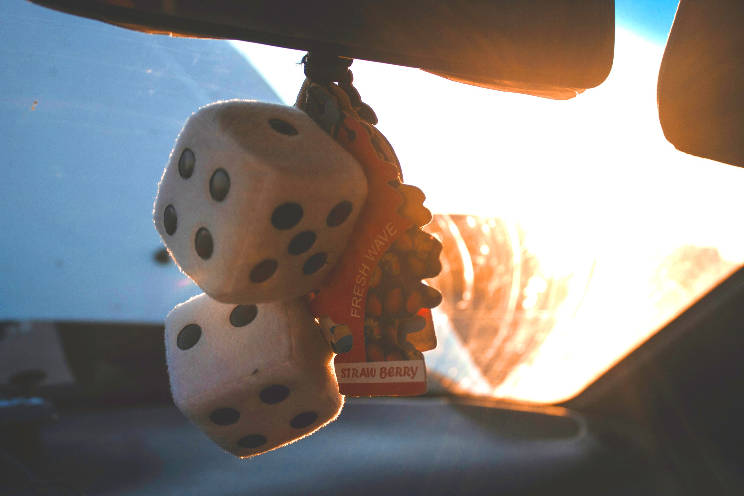 What you can get to personalize your vehicle at Boch Honda, Boch Toyota, Boch Nissan, Boch Hyundai, Boch Chevrolet, Genesis of Norwood, Boch Toyota South, Boch Honda West, Boch Nissan South, & Boch New to You in Massachusetts | Fuzzy dice and car freshener inside vehicle