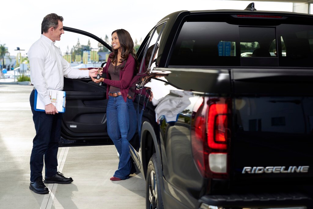 Boch Honda is a Car Dealership near Braintree, MA | Customer purchasing 2020 Honda Ridgeline from Honda financial advisor