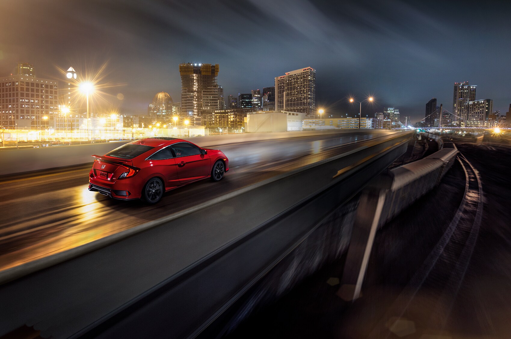 Boch Honda West is a Family Owned Dealership near Boxborough, MA | 2020 Honda Civic driving on highway at night