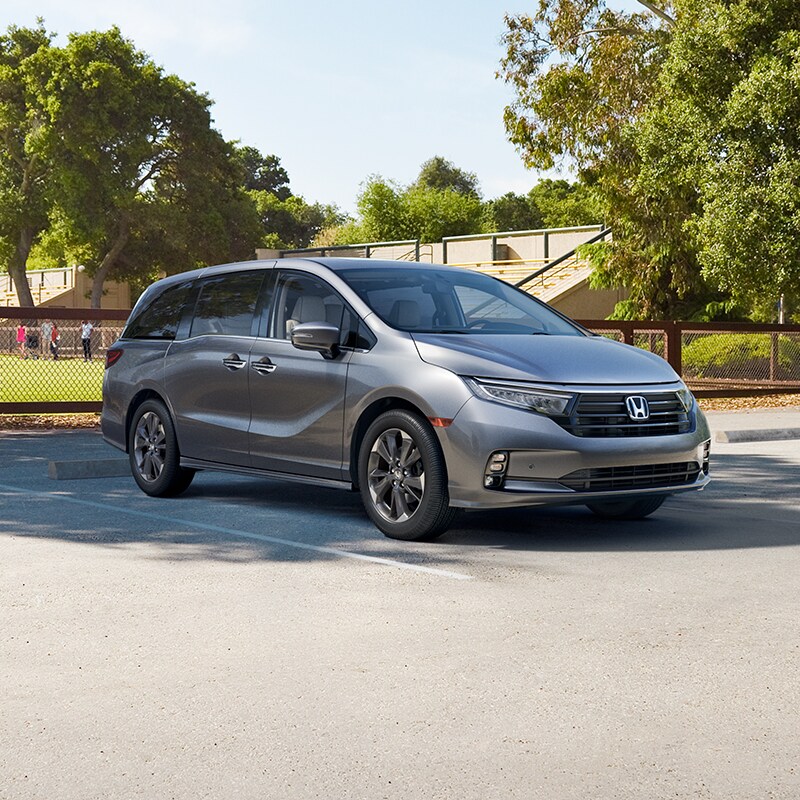 Boch Honda West is a Family Owned Dealership near Acton, MA | Silver 2020 Odyssey Parked Next to Soccer Field Boch Honda West is a Family Owned Dealership near Acton, MA | Silver 2020 Odyssey Parked Next to Soccer Field