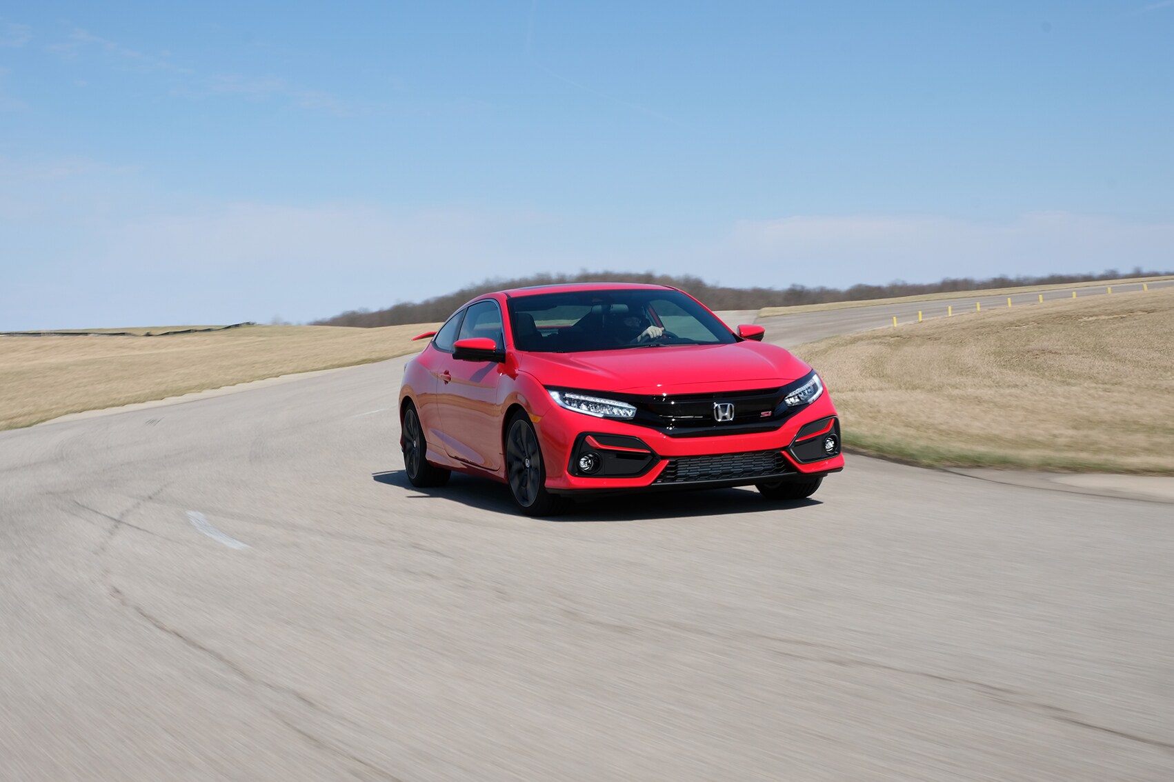 Boch Honda West is a Family Owned Dealership near Chelmsford, MA | Red 2020 Honda Civic on the track