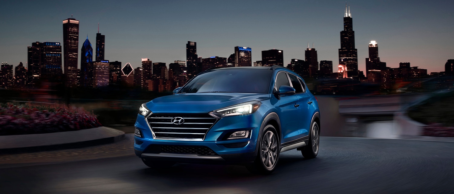what different tire options are available at Boch Hyundai in Norwood | Blue hyundai tucson parked on road what different tire options are available at Boch Hyundai in Norwood | Blue hyundai tucson parked on road
