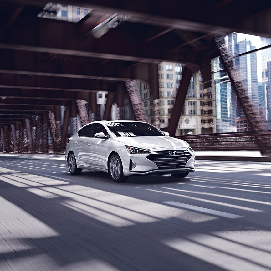 what different tire options are available at Boch Hyundai in Norwood | White hyundai elantra running on road what different tire options are available at Boch Hyundai in Norwood | White hyundai elantra running on road