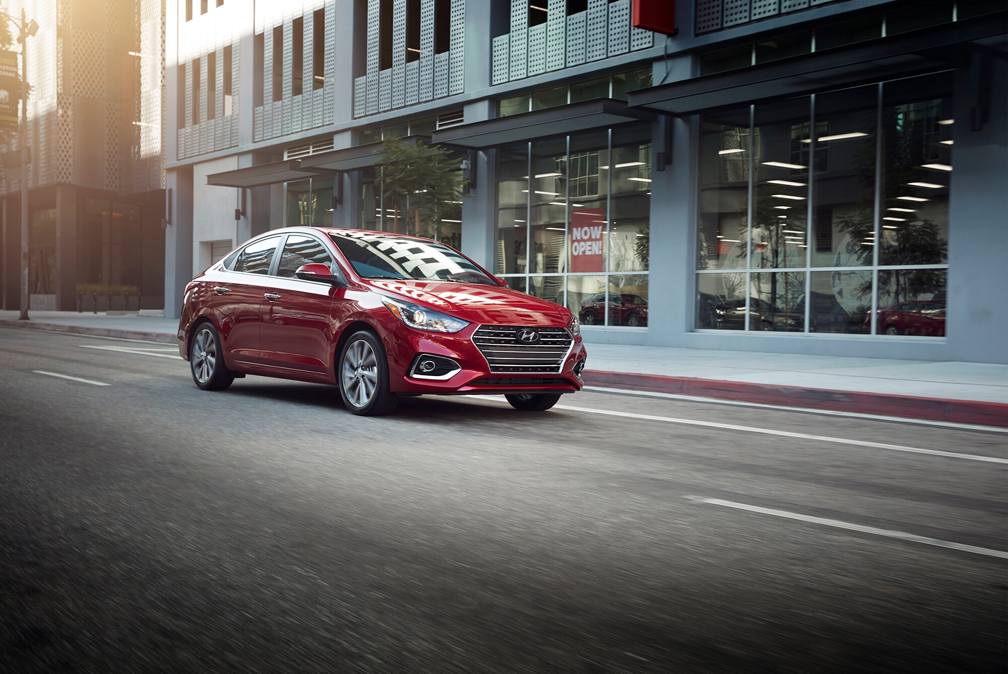 Boch Hyundai is a Car Dealership near Norwood, MA | 2020 Hyundai Accent driving on city street