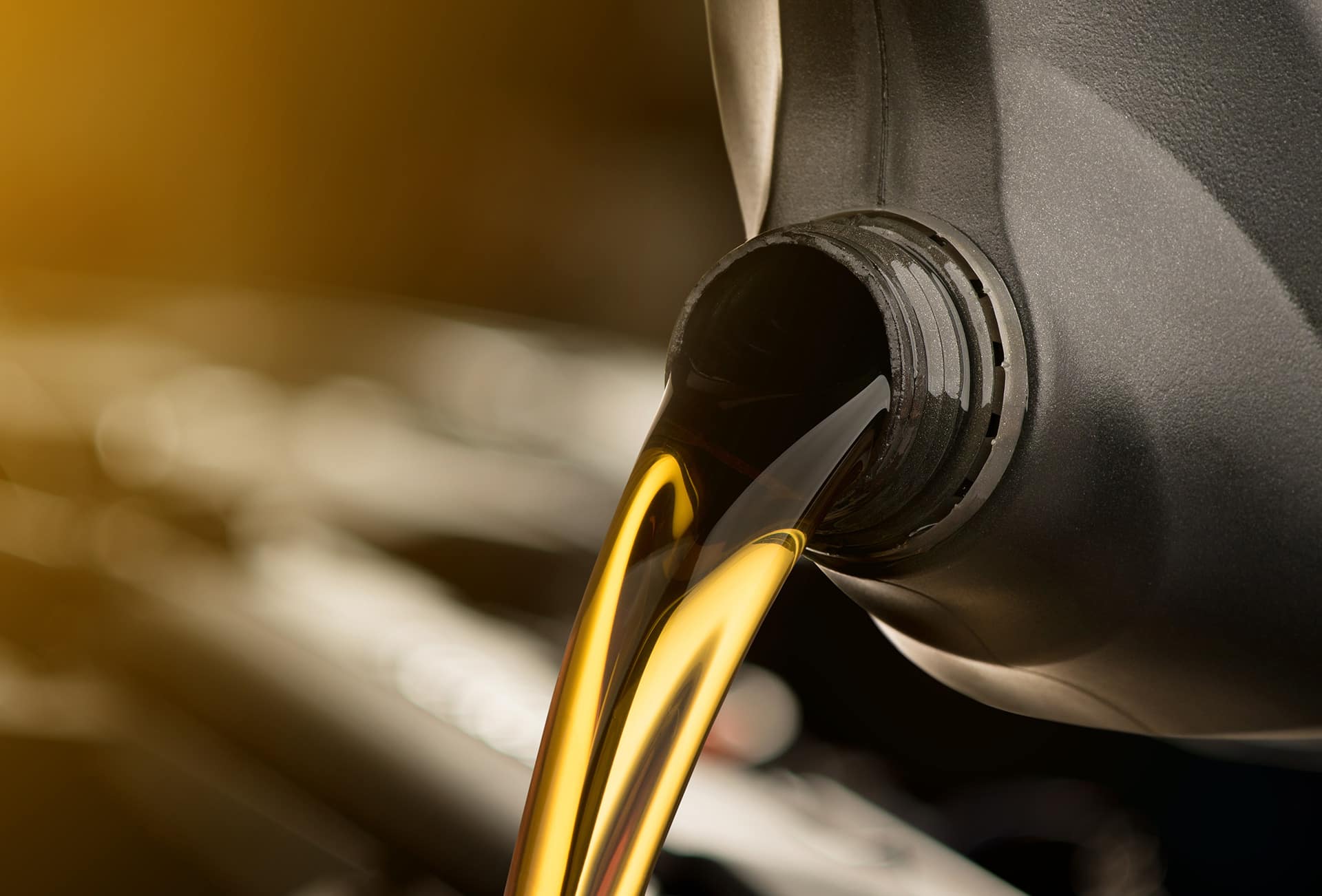 Boch Nissan is a Car Dealership near Brockton, MA | Oil being poured into engine