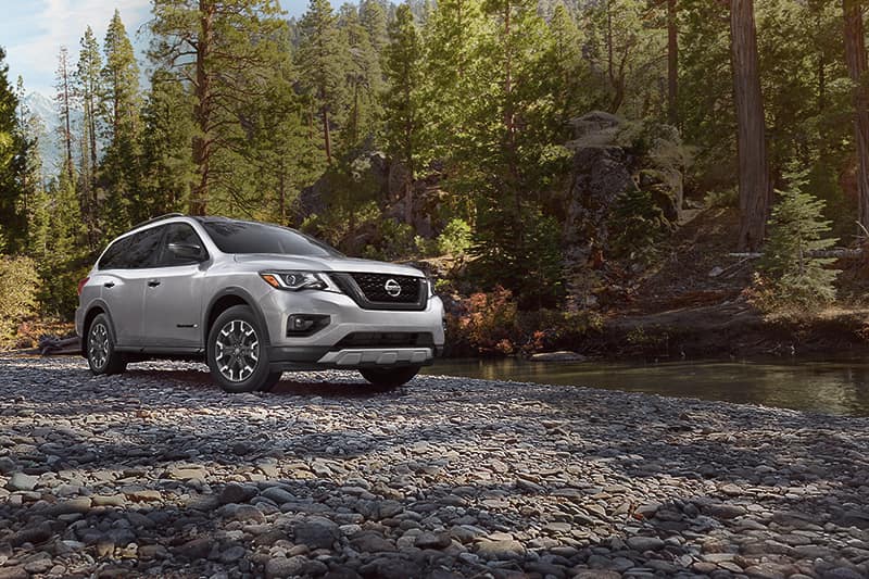 Boch Nissan South is a Family Owned Dealership near Lincoln, MA | Silver 2020 Nissan Pathfinder in the woods