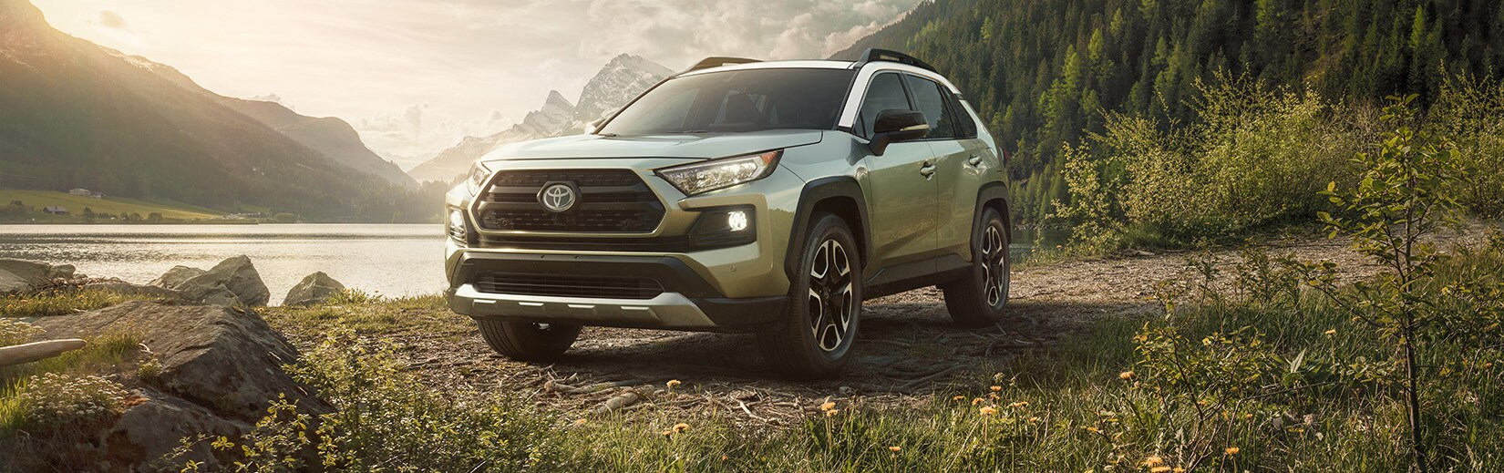 Boch Toyota is a Family Owned Dealership near Dover, MA | 2020 Toyota RAV4 parked by lake