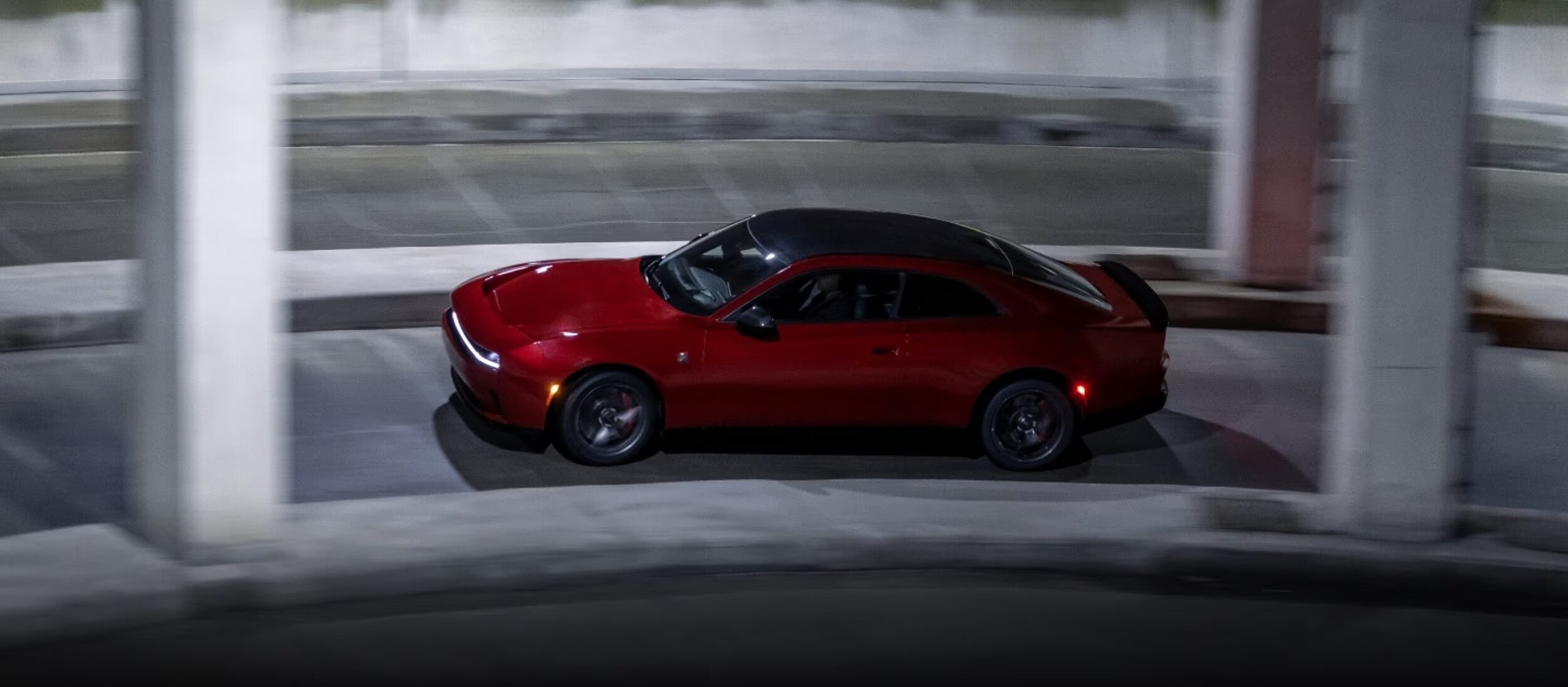 2026%20Dodge%20Charger%20driving%20near%20Baytown.jpeg 2026 Dodge Charger driving near Baytown