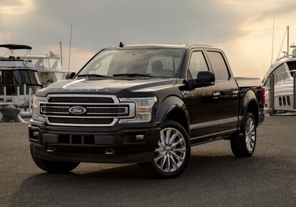 2020 Ford F-150 Exterior (1).png Front exterior of a 2020 Ford F-150 parked in a marina