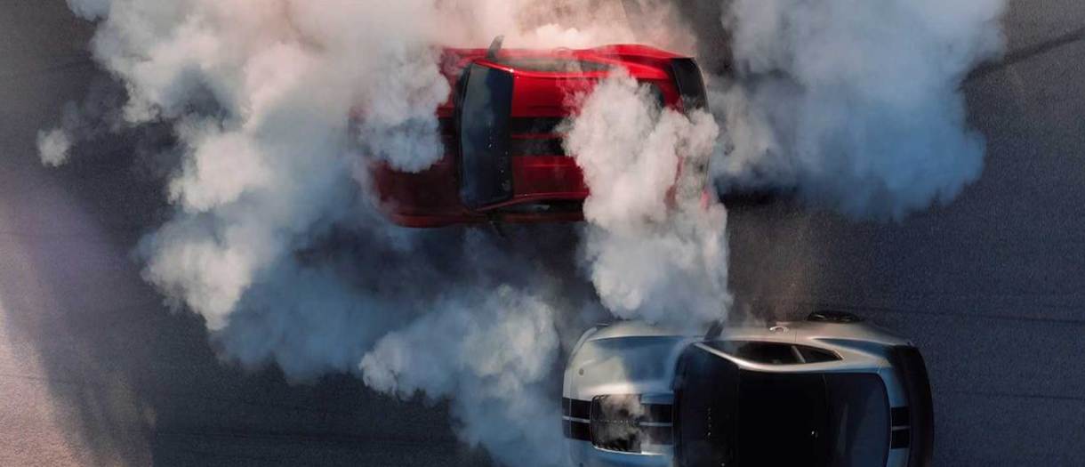 2020-ford-shelby-mustang-gt500-torque-bowen-scarff-ford-dealership-seattle-wa.jpg Side by opposite side, a red and silver 2020 GT500 burn rubber and create an inescapable surrounding smoke field.