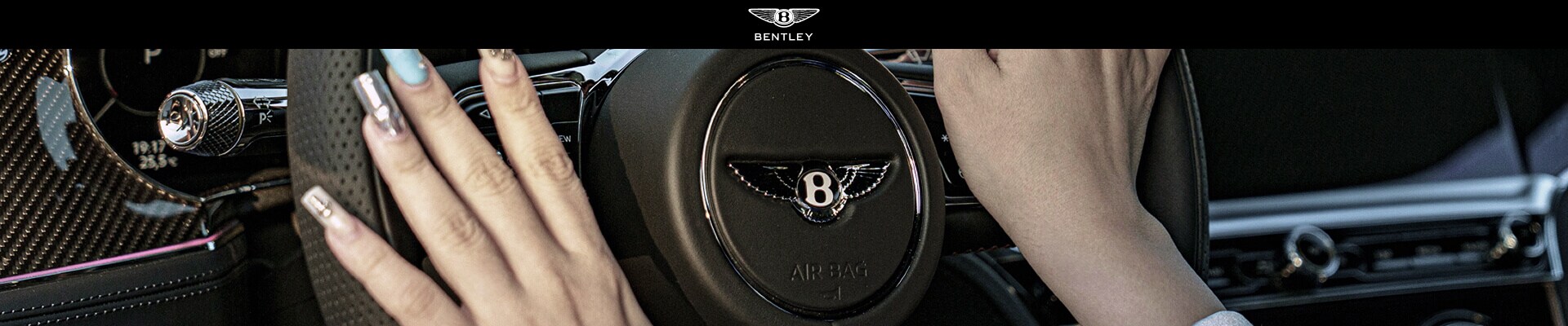 Close-up interior view of a passenger in a Bentley Continental GT sitting inside the luxurious cabin.