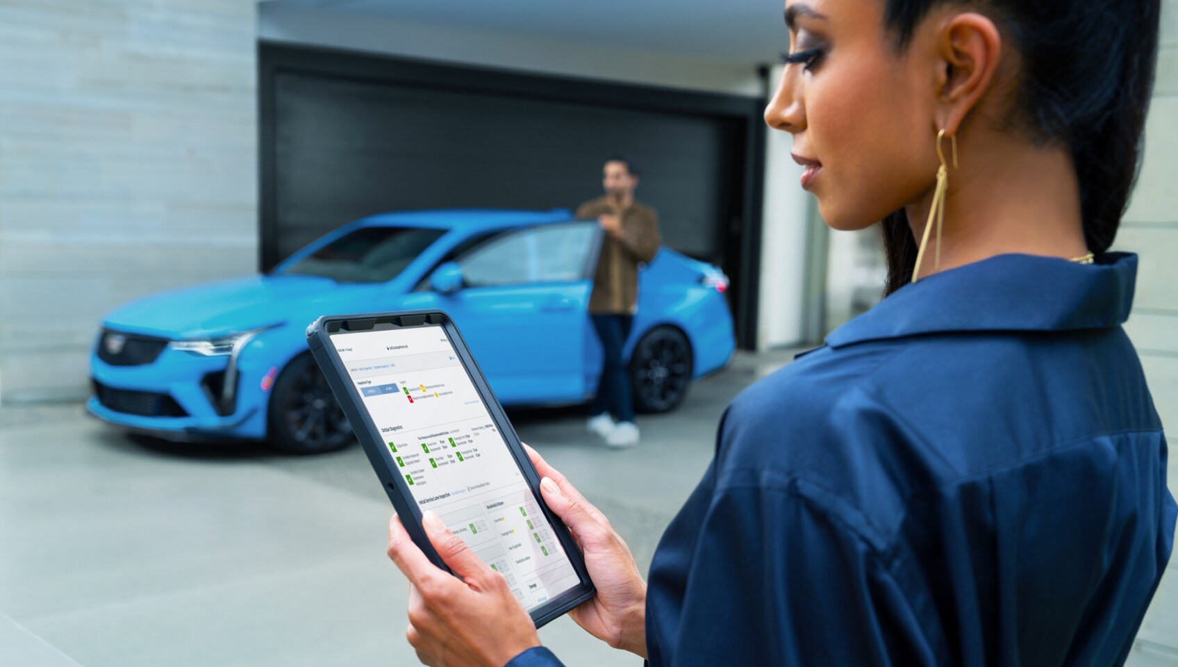 Service worker holding tablet