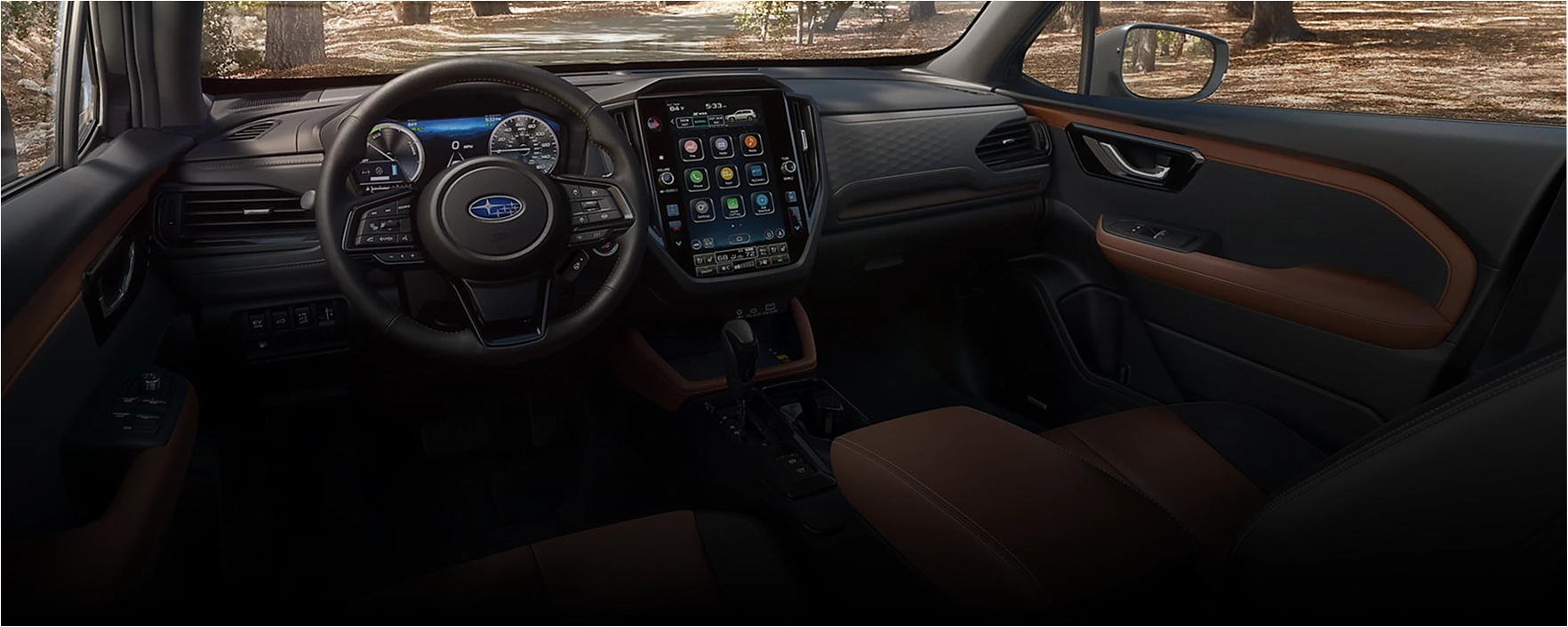 2026 Subaru Forester Hybrid front cabin with the large touchscreen multimedia display and steering wheel