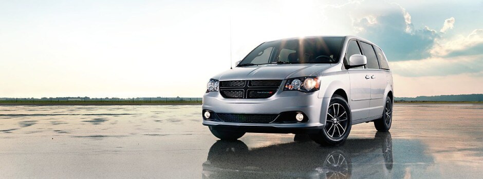 2017 Dodge Grand Caravan driving on wet pavement