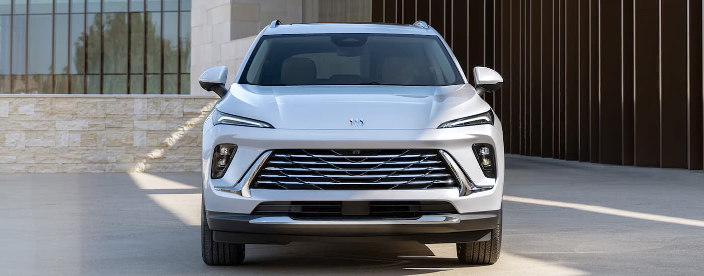 wlp%20-%202025%20Buick%20Envision%20for%20Sale%20Near%20Pembroke%20Pines%20-%20Front.jpg A silver 2025 Buick Envision parked in a driveway