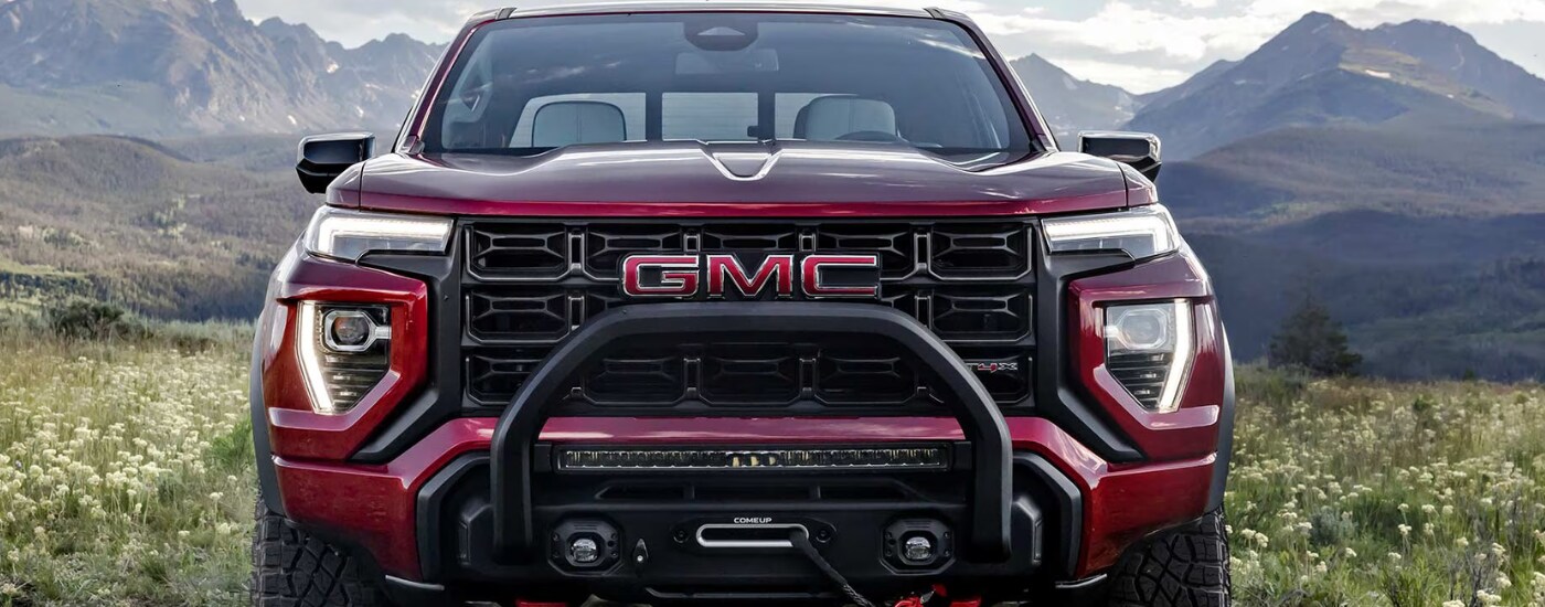 trucks%20for%20sale%20-%202025%20GMC%20Canyon%20-%20front.png Red 2025 GMC Canyon AT4 from the front