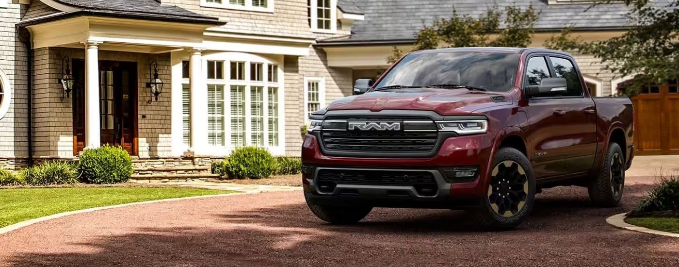 Ram%20Dealer%20-%202025%20Ram%201500%20Ramcharger%20-%20Driveway.jpg A maroon 2025 Ram 1500 Ramcharger is parked on a driveway.