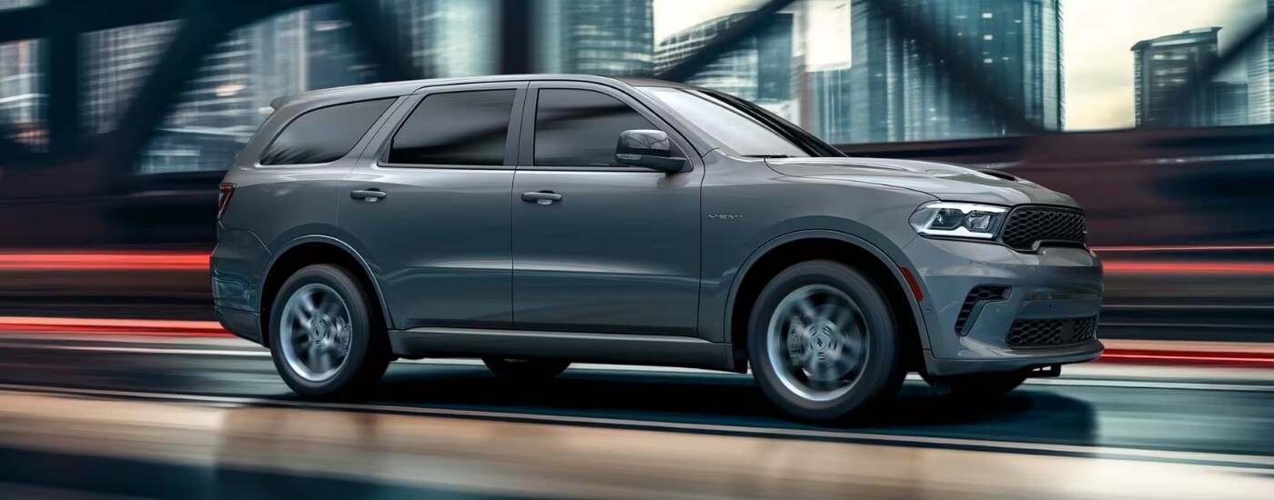 A grey 2025 Dodge Durango from the side.
