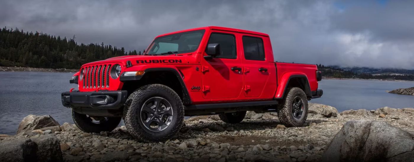 wlp%20-%202023%20Jeep%20Gladiator%20-%20Used%20Car%20Dealer%20Near%20Key%20Biscayne%20%20-%20Clouds.jpg A red 2023 Jeep Gladiator from a used car dealer near Key Biscayne
