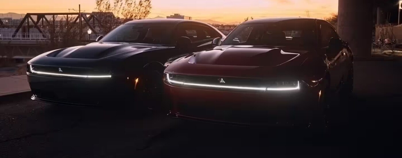 Dodge%20Charger%20Daytona%20for%20Sale%20Near%20Hialeah%20Gardens%20-%202025%20Dodge%20Charger%20Daytona%20-%20Duo.jpg Black and red 2025 Dodge Charger Daytona parked at dusk