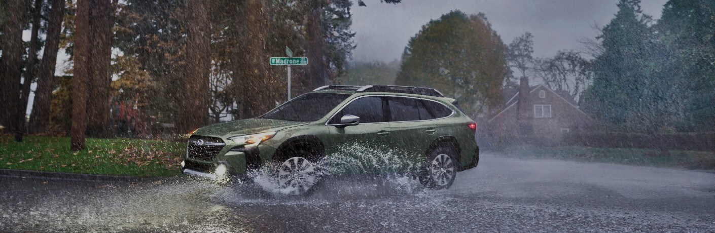 2023 Subaru Outback Exterior Driver Side Front Profile in the Rain_o.jpg