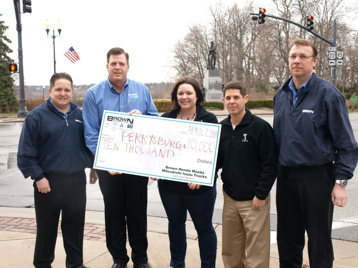 Brown Automotive gives Downtown Perrysburg a check for $10,000!