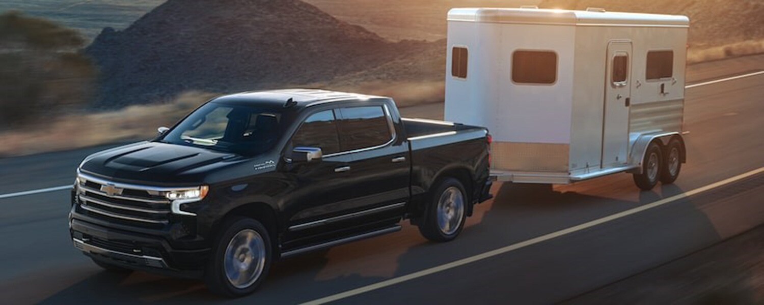 2026 Chevrolet Silverado 1500 Trim Comparison 2026 Chevrolet Silverado 1500 pulling a trailer