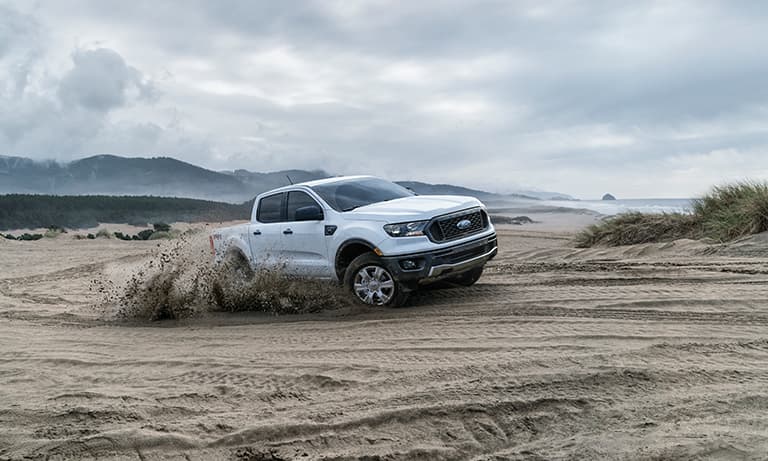 2019 White Ford Ranger Driving in Sand