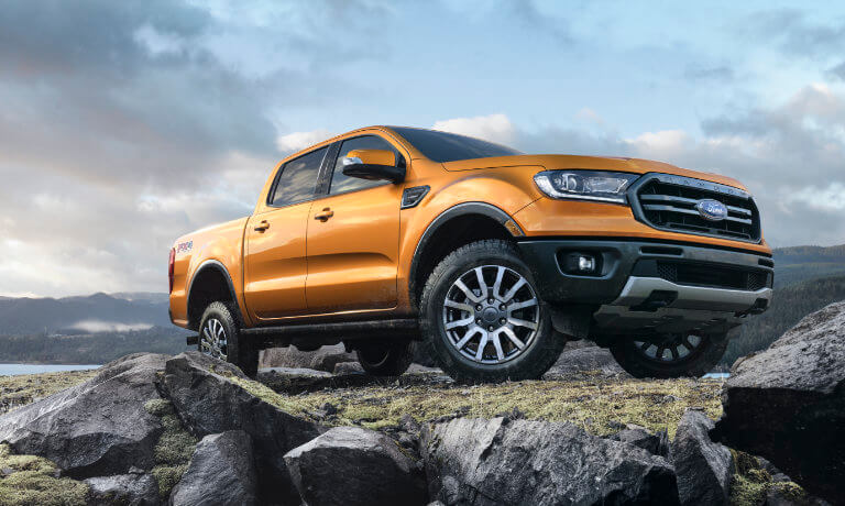 2019 Orange Ford Ranger Parked on a Rock