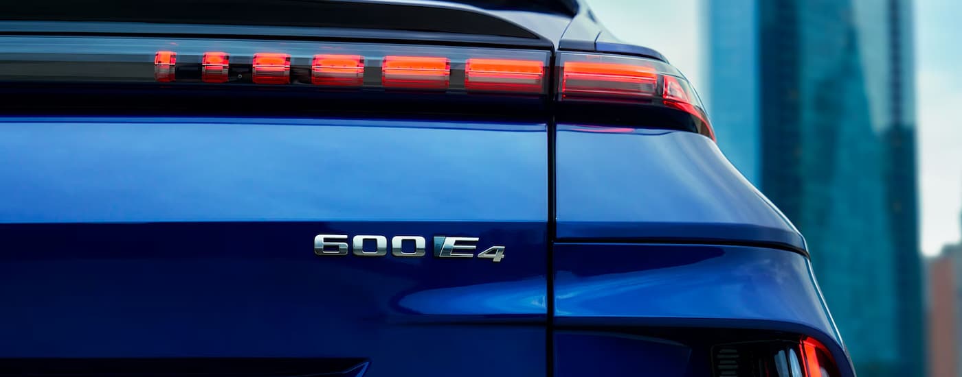Cadillac%20LYRIQ%20for%20Sale%20in%20New%20York%20City%20-%202024%20Cadillac%20LYRIQ%20-%20Blue%20Rear%20closeup.jpg A close up of the rear of a blue 2024 Cadillac LYRIQ.