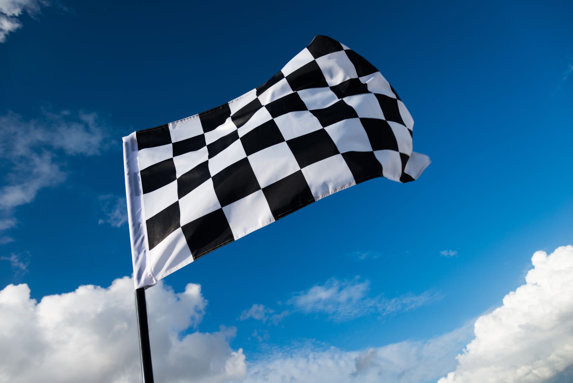A checkered Flag signals the end of a race.