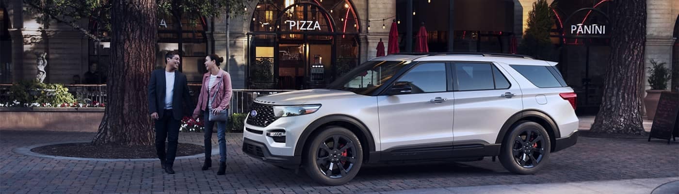 Couple-walking-to-a-Ford-Explorer.jpeg