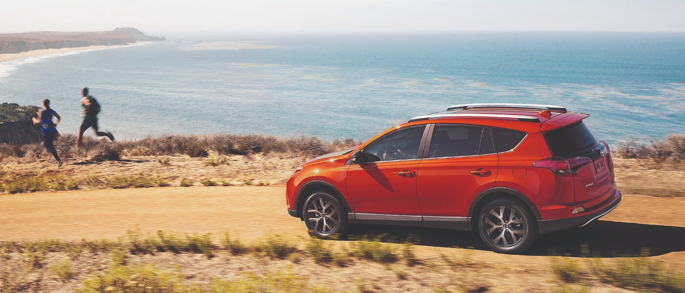 Toyota RAV4 on a beachside road