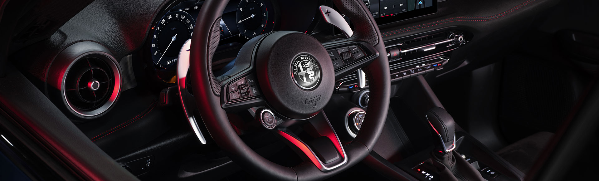 Alfa Romeo Tonale steering wheel interior.