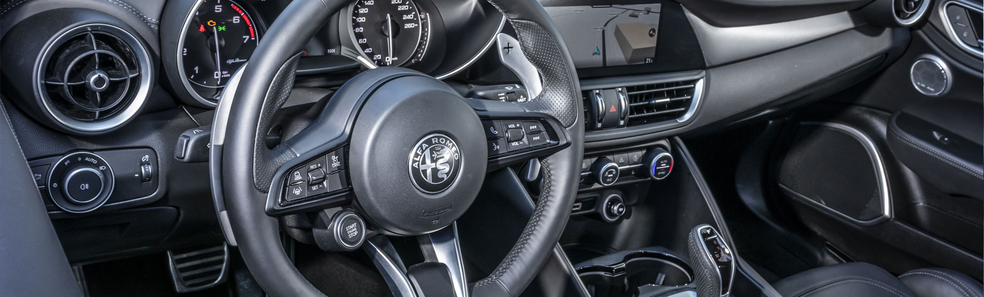 Alfa Romeo Giulia steering wheel interior.