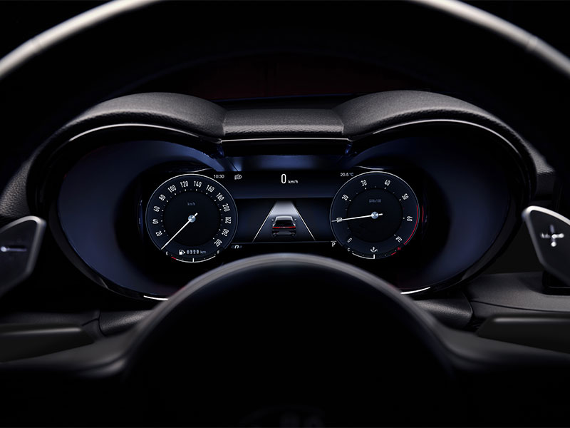 Alfa Romeo Tonale gauge cluster behind steering wheel.