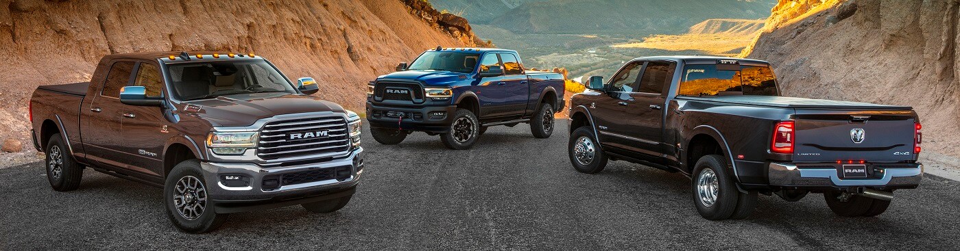 2022 Ram 2500 Heavy Duty Longhorn Mega Cab (left), Power Wagon (center) and 3500 Heavy Duty Limited Crew Cab Dually (right) 2022 Ram 2500 Heavy Duty Longhorn Mega Cab (left), Power Wagon (center) and 3500 Heavy Duty Limited Crew Cab Dually (right)