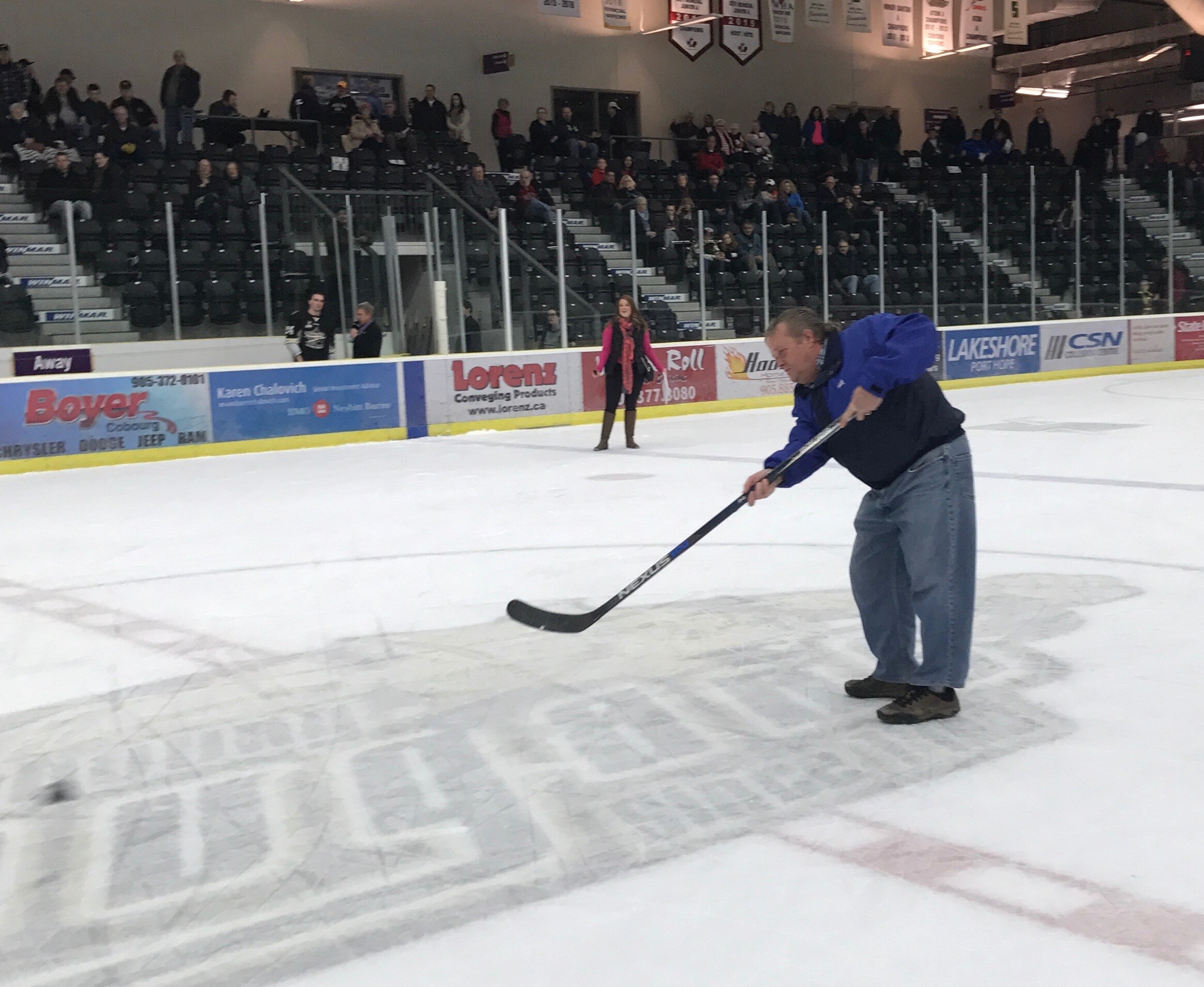 Larry participating in Boyer's shoot to win event
