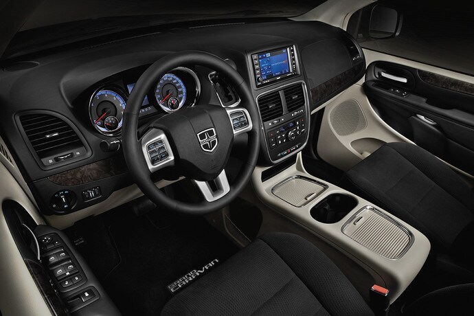 2019-dodge-grand-caravan-interior-super-console_61eee255fe24ae1efae5578e4d54681c-tabletRetina.jpg
