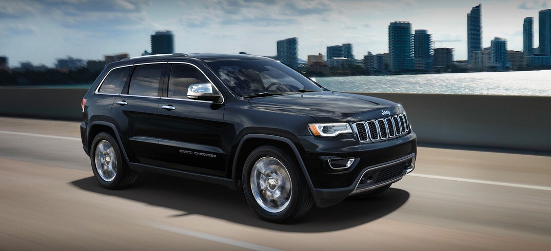 2019-jeep-grand-cherokee-desktop-driving-highway-city-skyline_c8beaac709b21e929b0acf8d47f93c5a-1248x533.jpg
