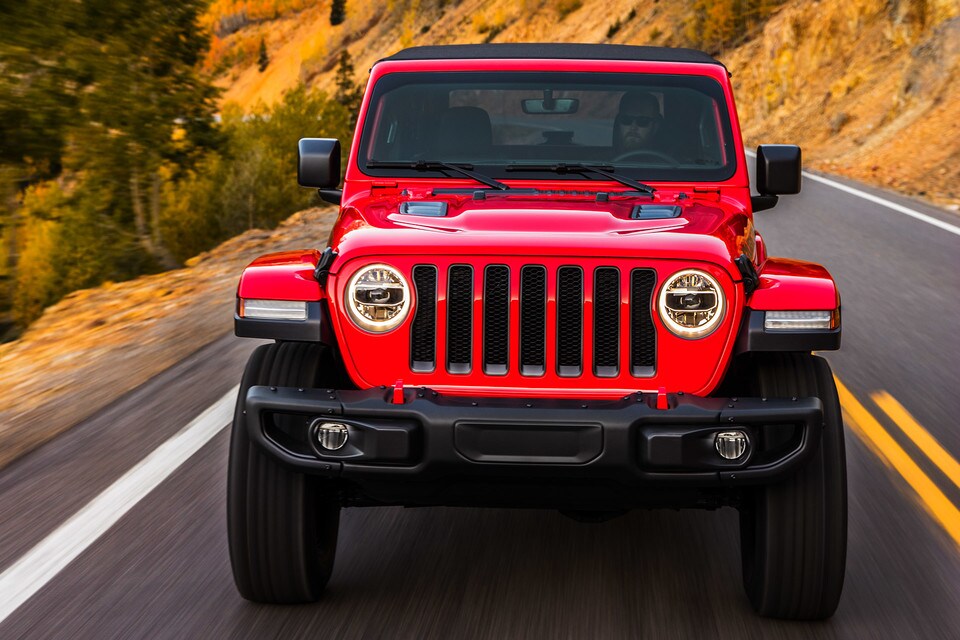 Red 2020 Jeep Wrangler Driving On Highway Mountain.jpg Red 2020 Jeep Wrangler Driving On Highway Mountain