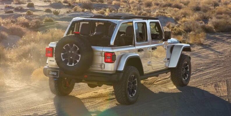 Mopar® Warranty Jeep Gladiator driving down a dirt road